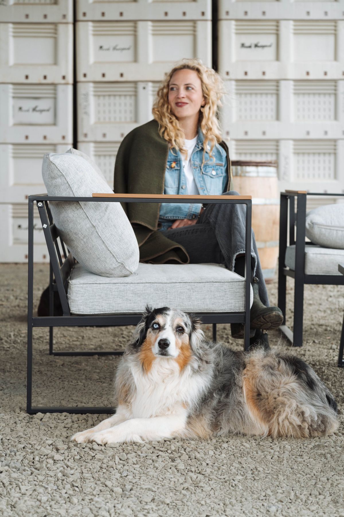 Piper at the winery with her Australian shepherd